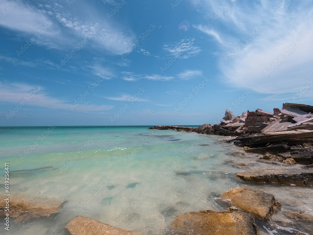 View of Cabo Catoche beach with crystalline waters on the island of Holbox in Mexico View of Cabo Catoche beach with crystalline waters on the island of Holbox in Mexico