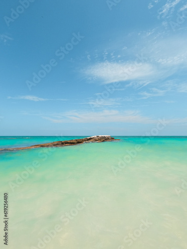 View of Cabo Catoche beach with crystalline waters on the island of Holbox in Mexico