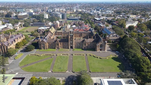 Aerial drone pullback reverse view of the University of Sydney at the Sydney CBD campus, NSW Australia showing the Great Hall on a sunny day    photo