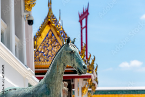 Horse statue at the Wat Suthat Buddhist Temple in Bangkok photo