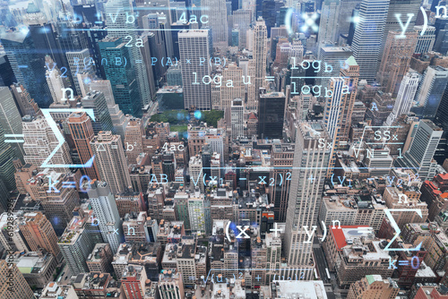 Aerial panoramic roof top city view of New York Financial Downtown district at day time. Manhattan  NYC  USA. Technologies and education concept. Academic research  top ranking university  hologram