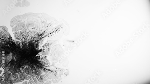 Black ink splatter. Liquid splash. Paint dash on white abstract illustration oil pattern floating spreading creative empty space background.