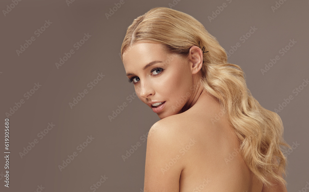 Portrait of beauty caucasian blond woman face clean skin beautiful female eyes lips with perfect healthy skin and long hairs, image with copy space.