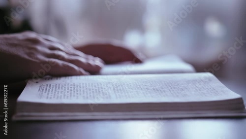 Wallpaper Mural Serene Moments: Woman Engrossed in Reading the Bible Torontodigital.ca