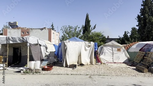 Makeshift huts and tents for earthquake victims
 photo