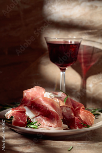 Prosciutto or Spanish jamon with rosemary and red wine.