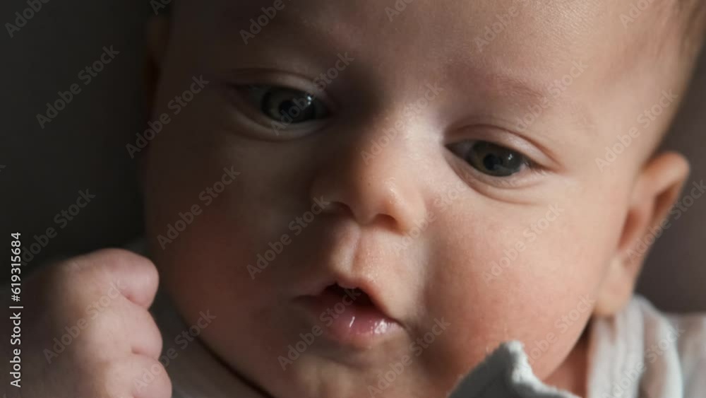 Beautiful caucasian newborn infant. Child lying in bed. Little kids concept. Close-up portrait
Beautiful caucasian newborn infant. Child lying in bed. Little kids concept. Close-up portrait