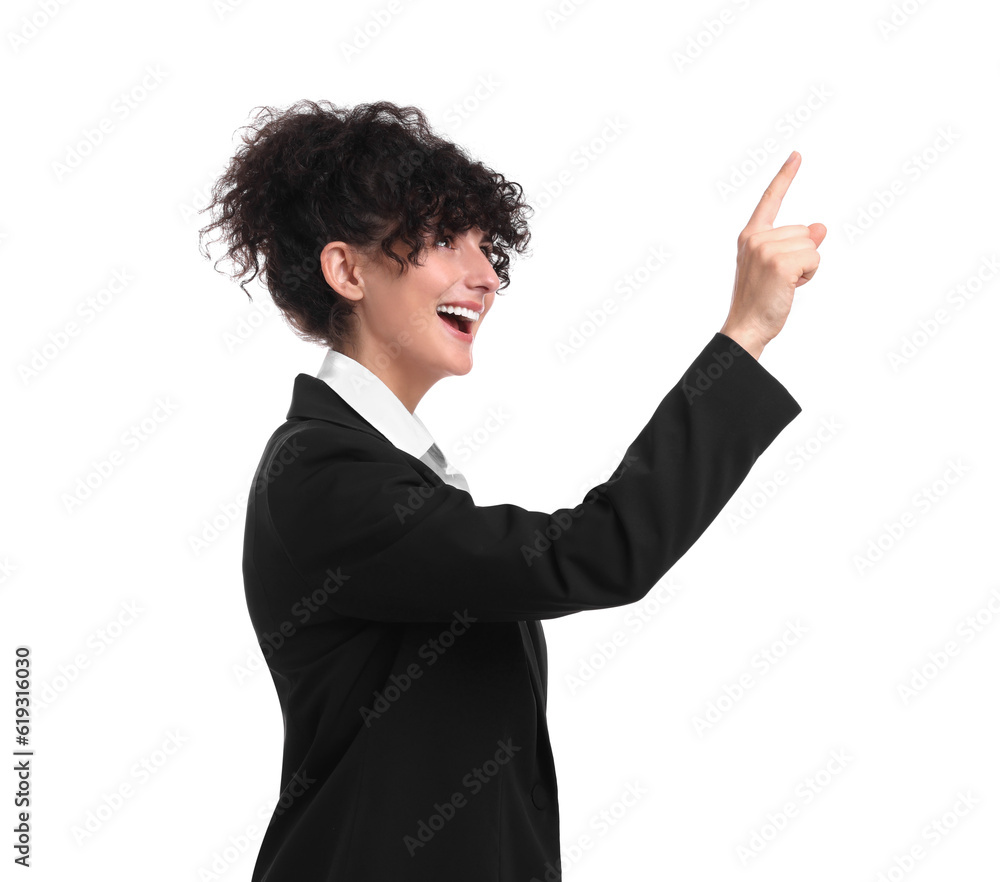 Beautiful happy businesswoman pointing at something on white background Beautiful happy businesswoman pointing at something on white background
