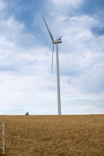 wind turbines generating power in the field