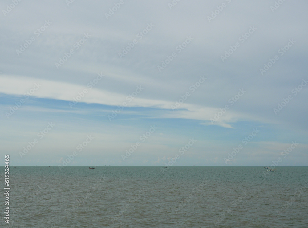Fishing boat on sea with blue sky and white cloud in background, Thailand Fishing boat on sea with blue sky and white cloud in background, Thailand