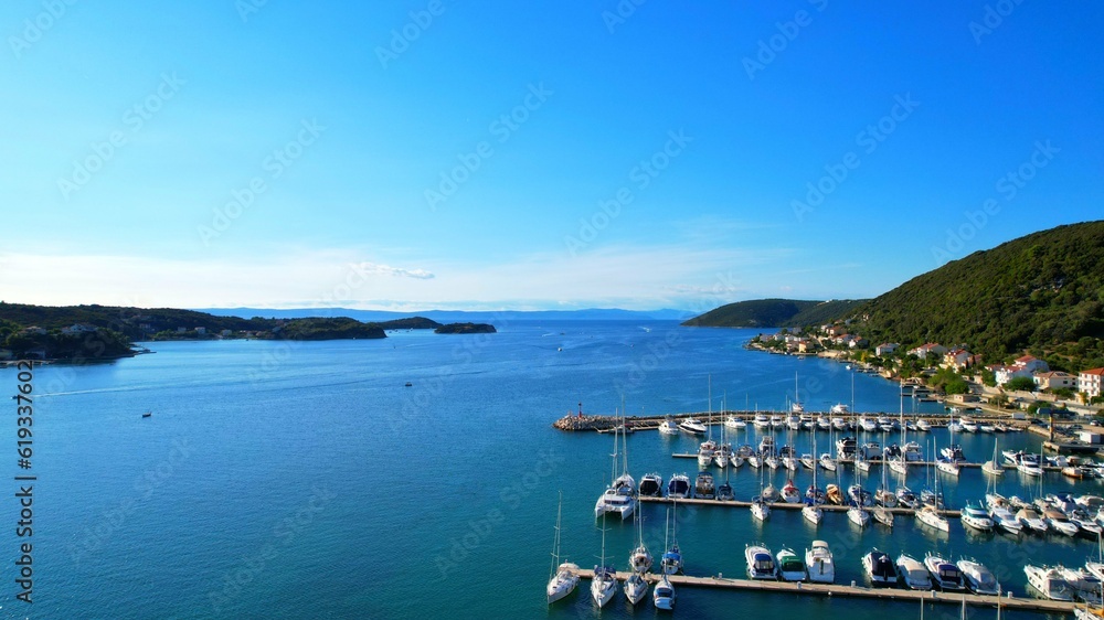 Supetarska Draga - Island Rab - Croatia - marina - The drone rises above the bay and opens up an amazing view of the Croatian islands