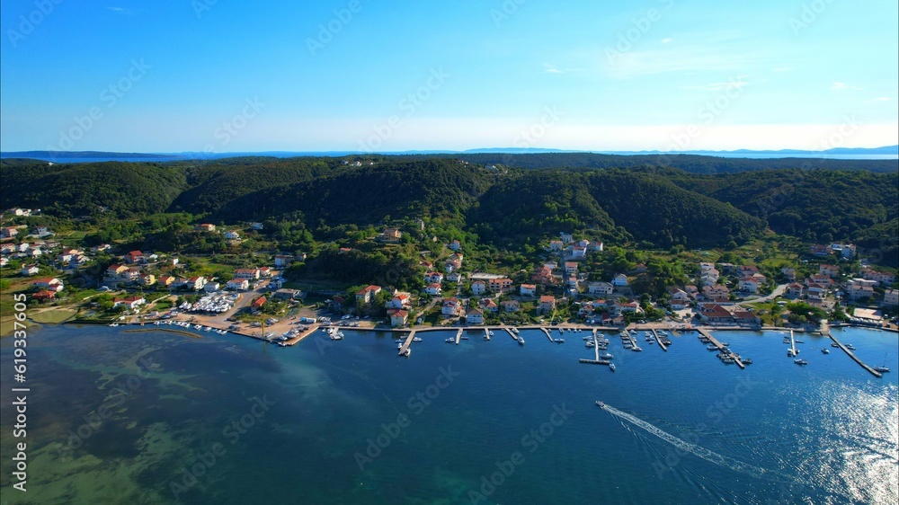 Supetarska Draga - Island Rab - Croatia - marina - The drone rises above the bay and opens up an amazing view 