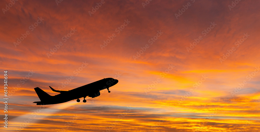 The plane takes off at sunset. The plane takes off at sunset.