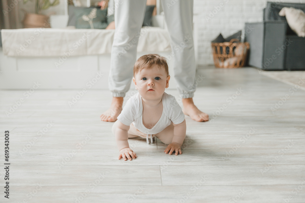 crawling baby 6 months in the nursery at home. crawling baby 6 months in the nursery at home.