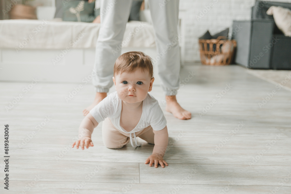 crawling baby 6 months in the nursery at home. crawling baby 6 months in the nursery at home.