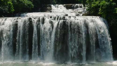 Aireal survey of beautiful water curtain like of Tinuy an Waterfall. Mindanao, Philippines. photo