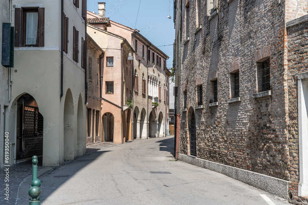 old houses on bending street, Treviso, Italy