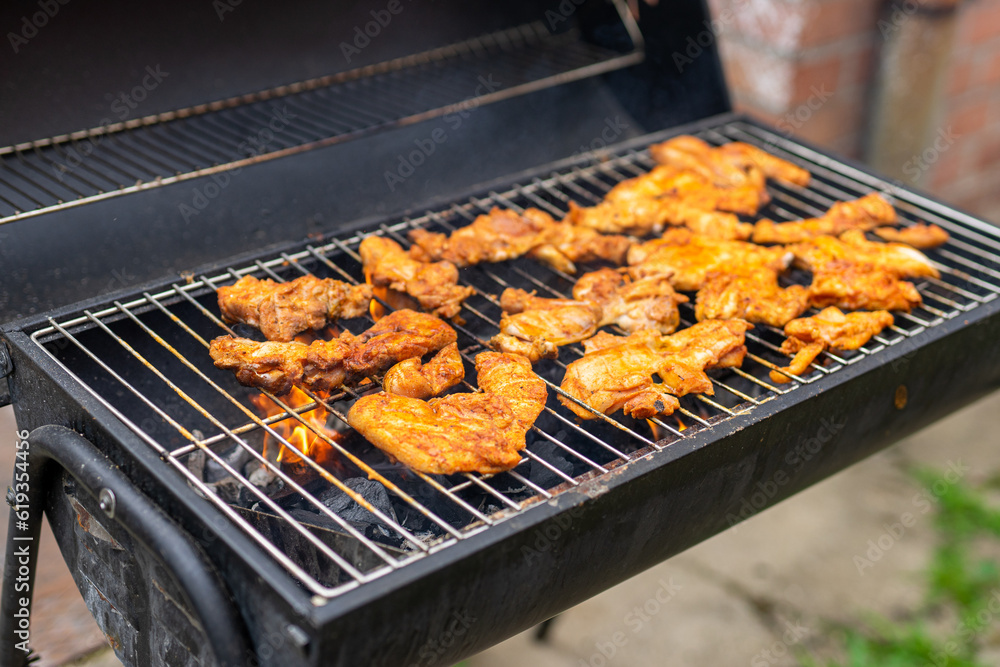  grilled chicken on the grill