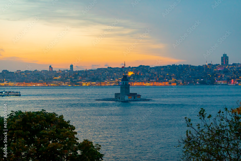 Istanbul Maiden Tower New (yeni kız kulesi), with a colorful and light show after restoration. The historical building is best touristic destination Istanbul. Maiden's Tower famous travel destination. Istanbul Maiden Tower New (yeni kız kulesi), with a colorful and light show after restoration. The historical building is best touristic destination Istanbul. Maiden's Tower famous travel destination.
