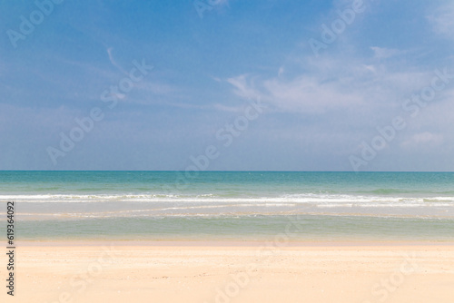 View of beautiful tropical sea beach with blue sky. © Axl4Real