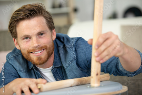 man preparing food at home kitchen photo