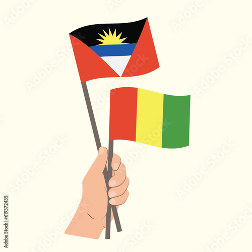 Flags of Antigua and Barbuda and Guinea, Hand Holding flags