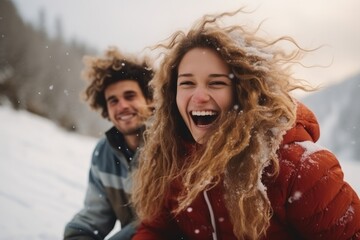 a girl and a man in the winter mountains. fun. travel concept. generative ai.