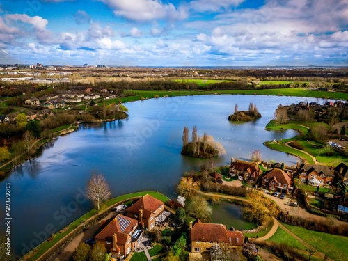 Aerial view of a town situated near a river in Milton Keynes photo