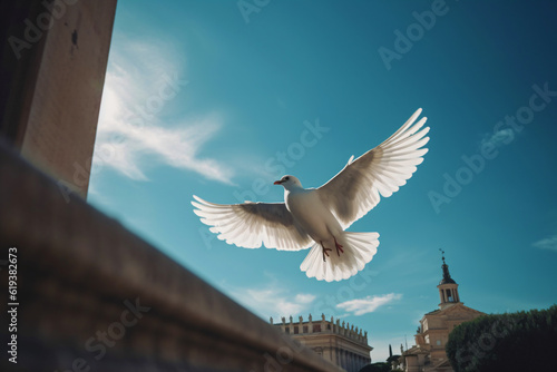 white dove of peace flies over a city with a blue sky