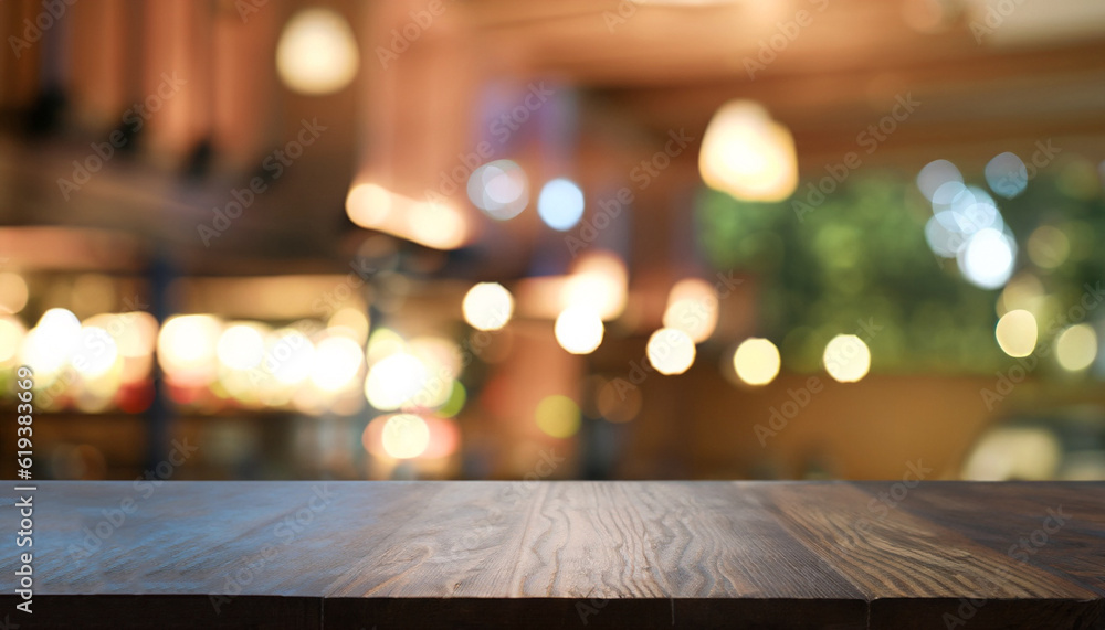 Empty wood table top on abstract blurred restaurant and cafe background - can be used for display or montage your products Empty wood table top on abstract blurred restaurant and cafe background - can be used for display or montage your products
