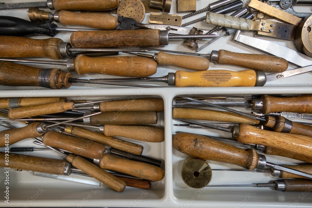 Variety of tools neatly arranged on a workbench Variety of tools neatly arranged on a workbench