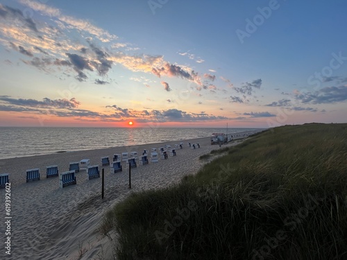 beach chairs at sunset on sylt beach 