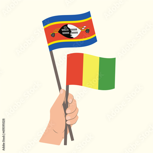 Flags of Eswatini and Guinea, Hand Holding flags