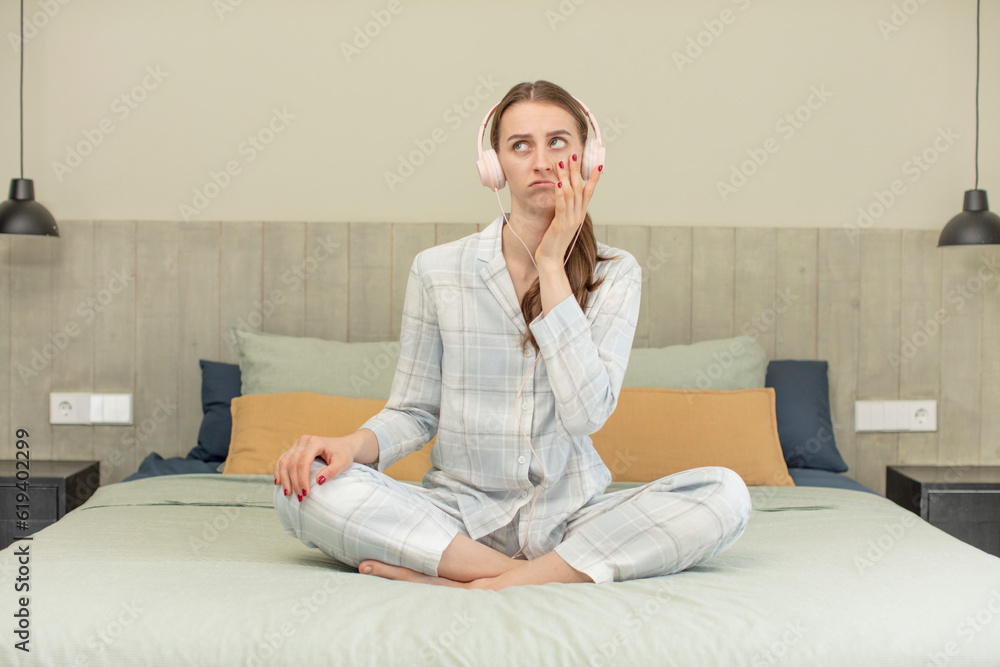 feeling bored, frustrated and sleepy after a tiresome. bed time concept feeling bored, frustrated and sleepy after a tiresome. bed time concept