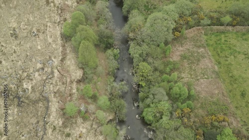 Wallpaper Mural Stream Flowing In Vegetated Rivershore In The Valley Of Kerry County In Ireland. Aerial Drone Shot Torontodigital.ca