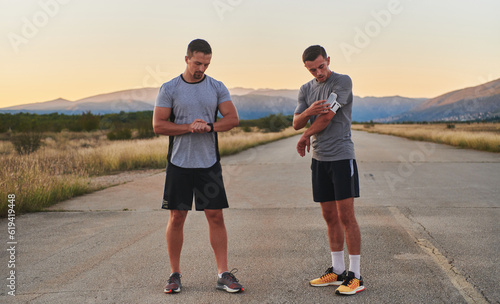 Group of handsome men running together in the early morning glow of the sunrise, embodying the essence of fitness, vitality, and the invigorating joy of embracing nature's tranquility during their
