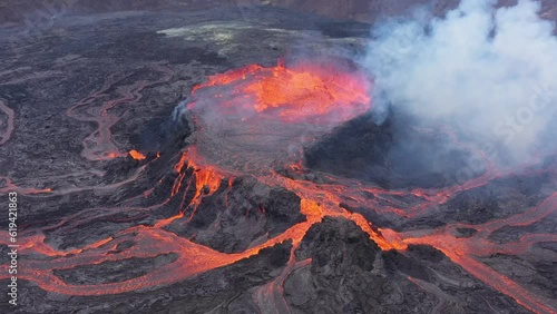 Active volcano with crater and outflowing lava, aerial view, drone video, Fagradalsfjall, Reykjanes Peninsula, Iceland, Europe photo