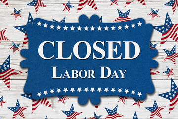 Closed Labor Day sign with USA stars and stripes flags