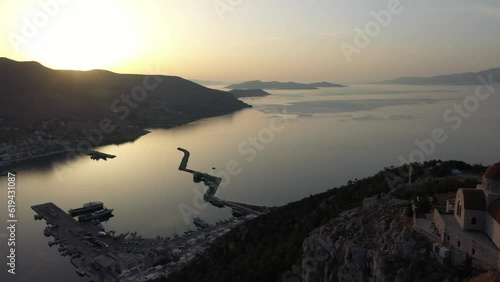 Drone shot, Greek Orthodox Monastery of Saint Savvas, Kalymnos town view, harbour and sea, Kalymnos, Dodecanese, Greece, Europe photo