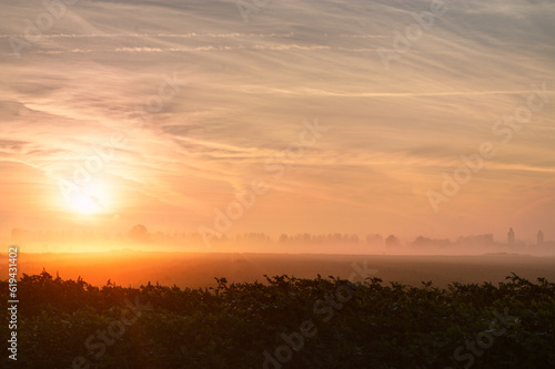 Sunrise over the misty acres of Neer, Leudal, Limburg, the Netherlands.