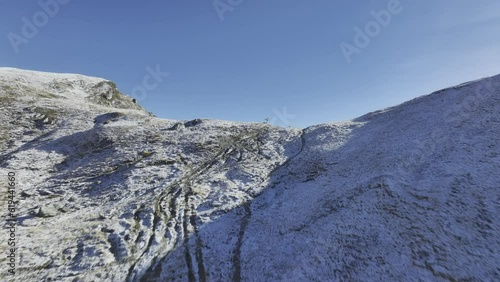 Snowy ascent to Col de Cou, drone shot, Val dHerens, Valais, Switzerland, Europe photo