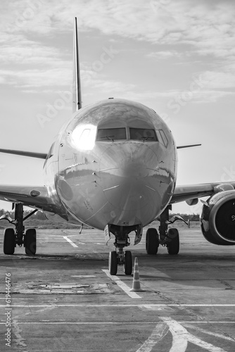 airplane in the airport, black and white photo with shallow depth of field