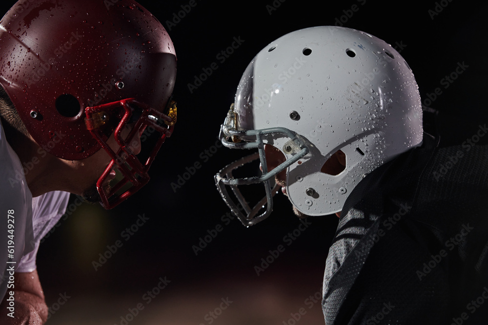 Two american football players face to face in silhouette shadow on white background