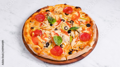 Mixed ingredients pizza isolated