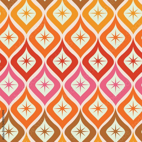 Mid century atomic starbursts on colorful ogee shapes seamless pattern in orange, yellow, red , pink and brown. For home decor, fabric and textile 