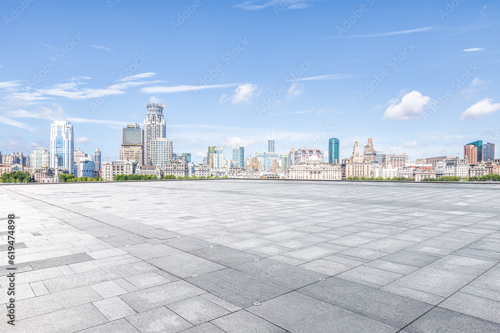Empty square road and city skyline in Shanghai, China