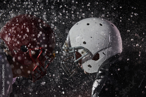 Two american football players face to face in silhouette shadow on white background