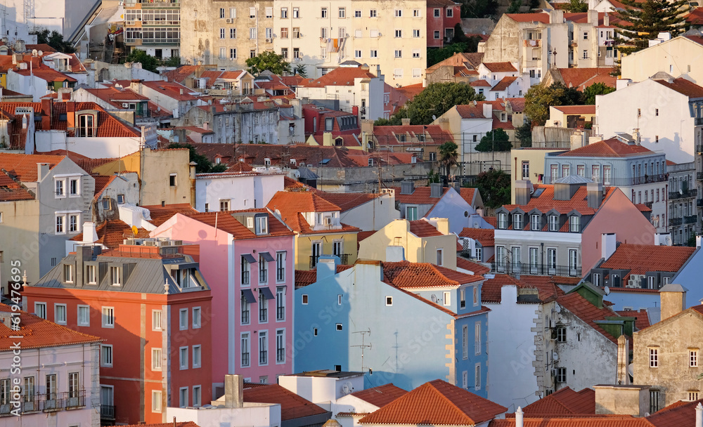 Buildings and roof tops in Lisbon in the afternoon hours with clear sky