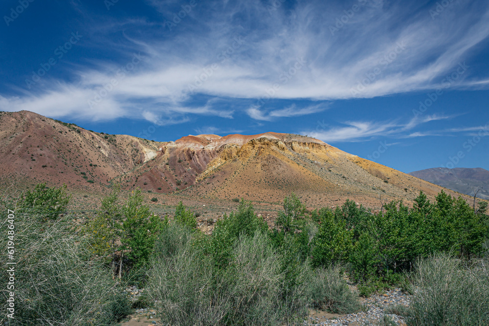 Picturesque canyon with hills of different colors: red, yellow, orange, white. Kyzyl-Chin tract, Altai Mars Picturesque canyon with hills of different colors: red, yellow, orange, white. Kyzyl-Chin tract, Altai Mars
