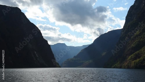 View from an electrical cruise ship on Sognefjord,  Aurlandsfjord Flam, Norway. Impressive mountain landscape of fjords and blue water photo